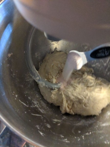 1½ tsp of salt is added to the bowl of a stand mixer with the dough hook attached.